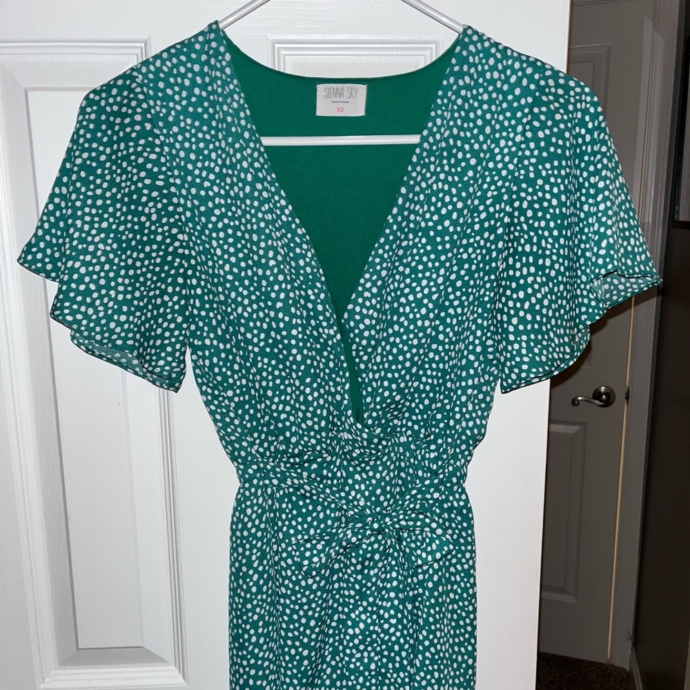 V neck flutter sleeve tie high low green polka dot dress
